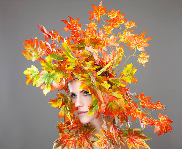 istock Beautiful young woman wrapped in leafs 468283650