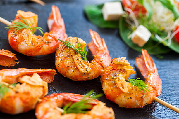 istock Giant Shrimp skewers. 468290884