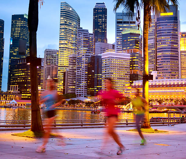 istock Blurred joggers with Singapore city background 468291426