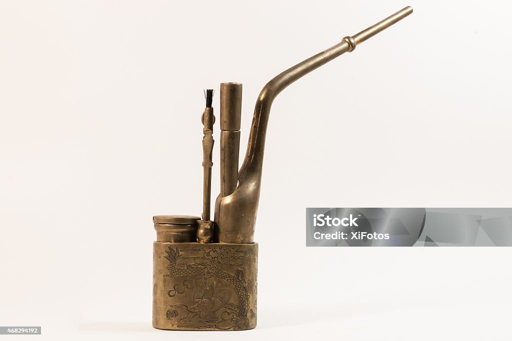 Still Life Of An Old Chinese Brass Tobacco Water Pipe Stock Photo -  Download Image Now - iStock