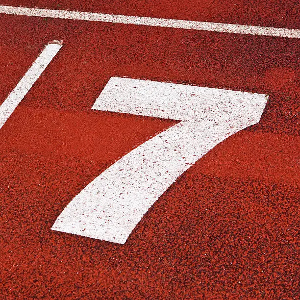 Close up of number seven on a running-track