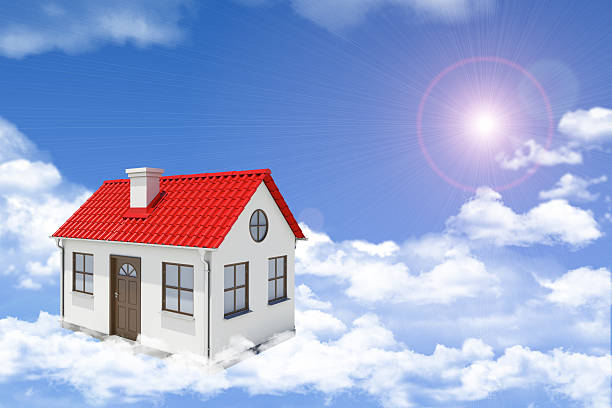 istock White house with red gable roof and chimney floating in 468299632