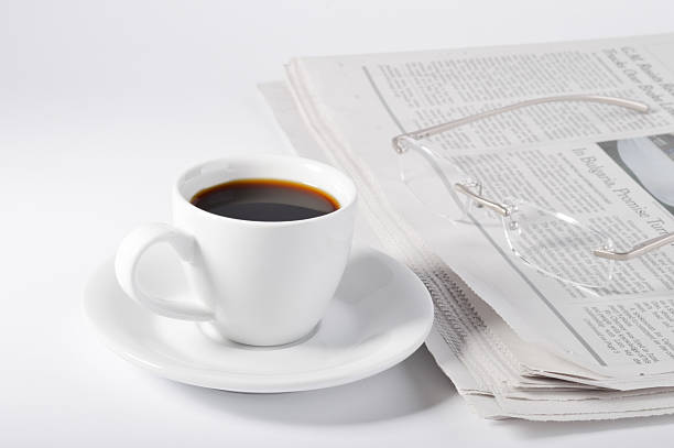istock Cup of coffee, glasses and newspaper. 468300284