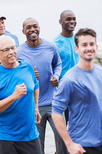 istock Multi-racial group of men wearing blue shirts 468303830