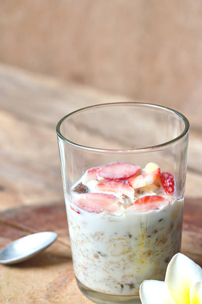 istock Crunchy musli (whole grain oats) served with fresh strawberries 468303926