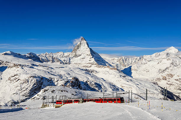 istock Cog train approaching the last stop at Gornergrat, Switzerland 468306456