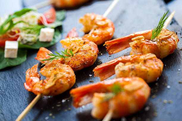 istock Roasted shrimp starter on skewer. 468306506