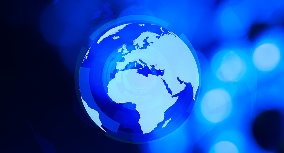 World globe and blue defocused background