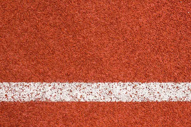 Photo of Abstract running track background.