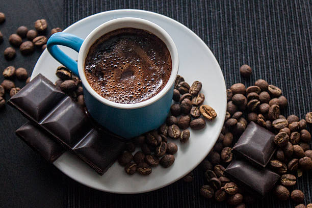 Nice Turkish coffee with chocolate and coffee beans stock photo