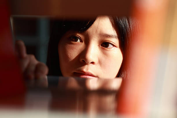 istock Young Woman in Library 468315635
