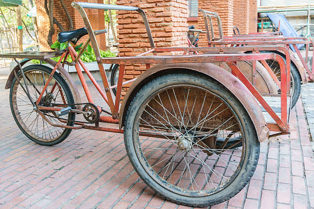 istock red trishaw for transportation in parking 468319034