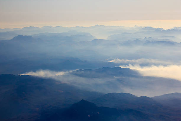 istock White clouds in blue sky. Aerial view from airplane 468322862