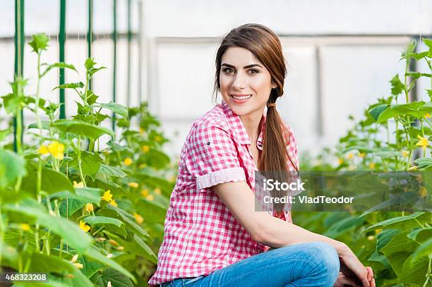 Young Woman Gardening Stock Photo - Download Image Now - 2015, Adult, Adults Only