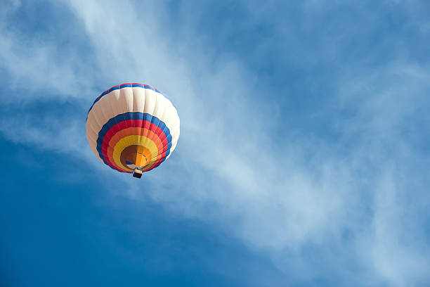 istock Multicolored Balloon in the blue sky 468324697