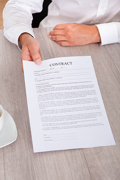 istock Businessman Holding Contract Paper 468326115