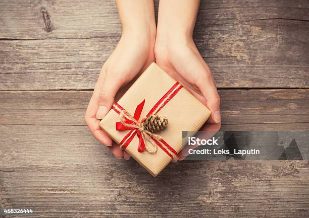 Holding A Gift Box Stock Photo - Download Image Now - 2015, Adult, Beauty