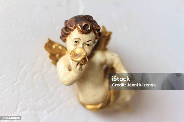 Sweet Antique Wood Cherubangel With Gold Trumpet Stock Photo - Download Image Now - Trumpet, Angel, Cherub