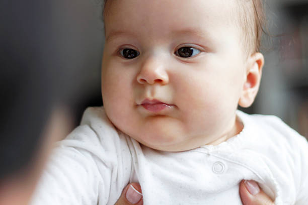 istock Baby is Looking to Her Mother 468330992