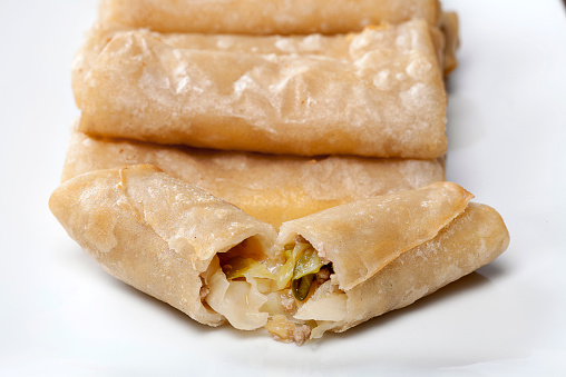 Chinese food - harumaki (spring roll), on white plate