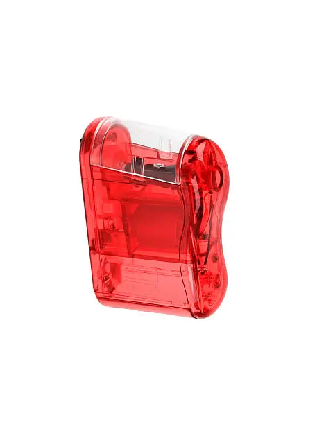 red pencil-sharpener isolated on a white background