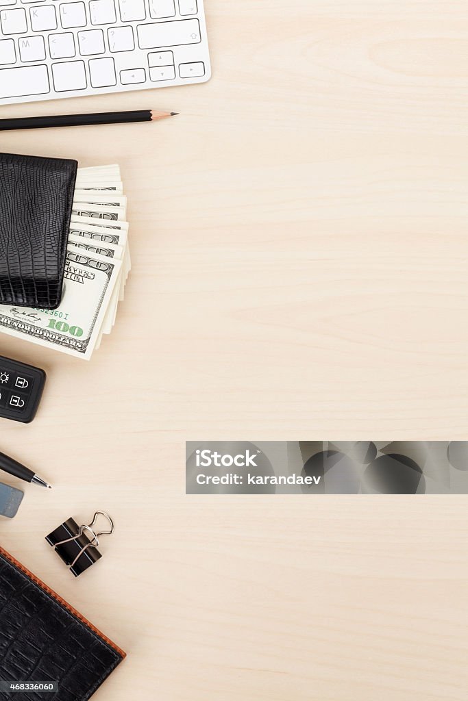 Office table with pc, supplies and money cash Office table with pc, supplies and money cash. View from above with copy space 2015 Stock Photo