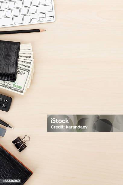 Office Table With Pc Supplies And Money Cash Stock Photo - Download Image Now - 2015, Above, Backgrounds
