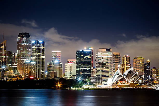 Sydney Harbor skyline at night Sydney Harbour with Sydney opera house at night, Australia opera house stock pictures, royalty-free photos & images