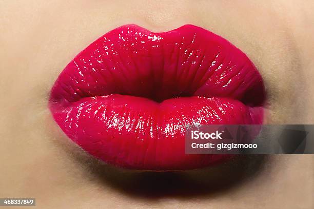 Woman With Puckered Lips And Red Lipstick Stock Photo - Download Image Now - Human Lips, Red, Adult