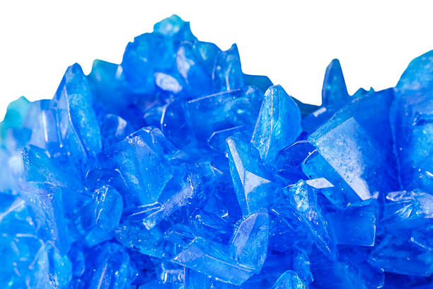 istock Chalcanthite blue stone copper sulfate crystals on white background 468340702