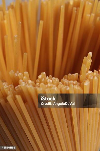Raw Spaghetti Pasta In Jar Stock Photo - Download Image Now - 2015, Backgrounds, Blue