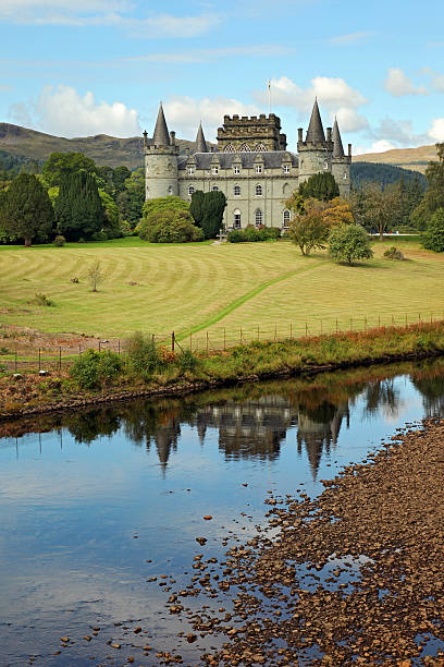 Inverary Castle - Scotland Inveraray, Scotland - September 9th, 2013. One of Scotland's most famous Castles, Inveraray is the ancestral home of the Dukes of Argyll, and is a 'must-see' item on the local tourist itinerary. It lies beside Loch Fyne and the picturesque planned village of Inveraray. loch fyne stock pictures, royalty-free photos & images