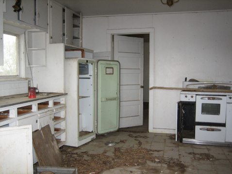 A long abandoned house in rural New Mexico. This shot shows the kitchen.