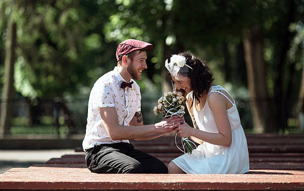 istock beautiful couple in park 468348610