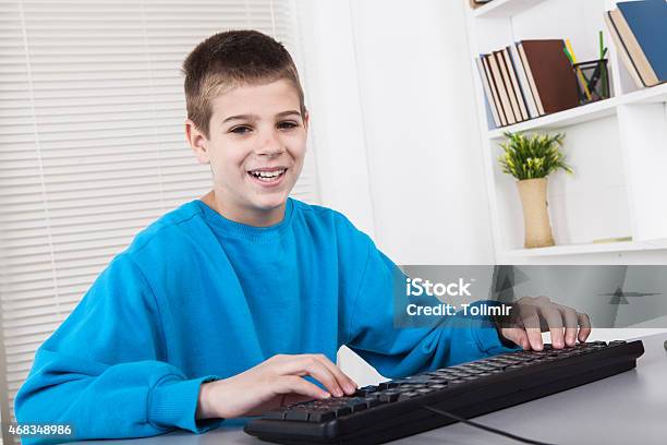 Working On Computer Stock Photo - Download Image Now - 10-11 Years, 2015, Boys