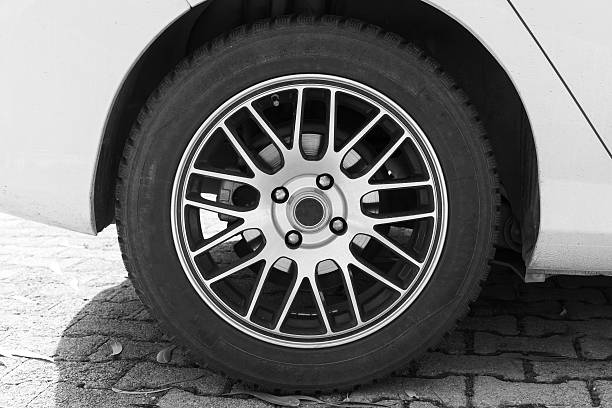 istock White modern car fragment with wheel on steel disc 468350102