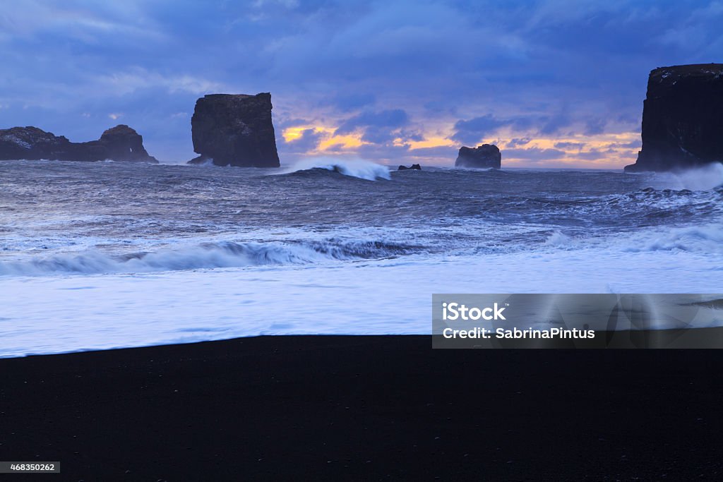 Dyrholaey beach at sunset 2015 Stock Photo