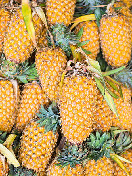 istock Pineapples on market in Kandy 468353070
