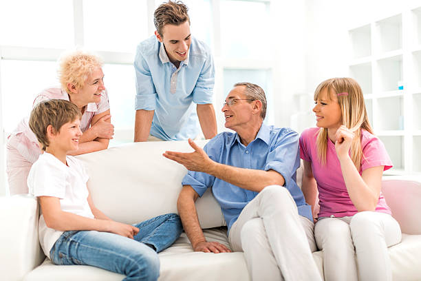 istock Happy family communicating at home. 468353516