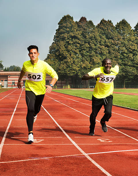 istock Two Athletes Running to the Finish Line 468354252