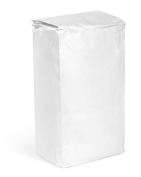 istock Blank white paper bag filled with flour isolated on white 468356742