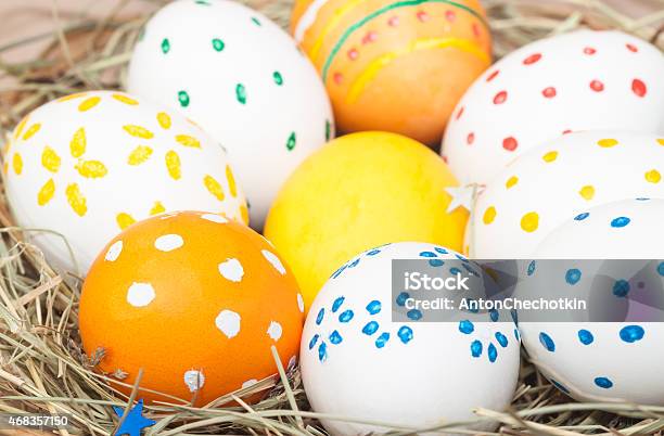 Colored Easter Eggs In Basket Stock Photo - Download Image Now - 2015, Basket, Brown