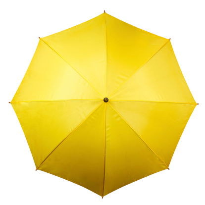 Yellow umbrella isolated on white background