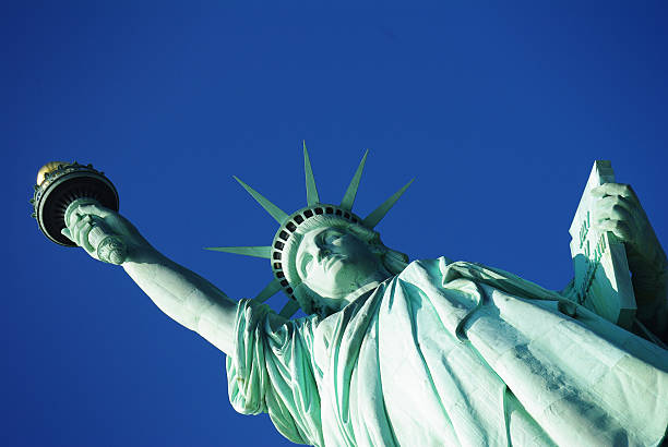 istock Close Up of Lady Liberty with Blue Sky (No Clouds) 468368872