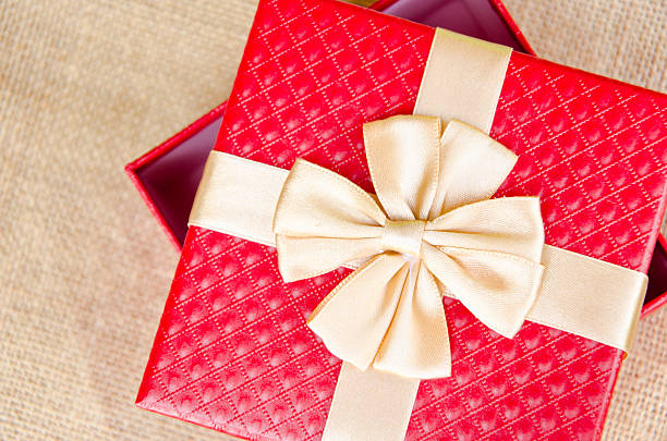 istock gift box with gold  ribbon 468369438