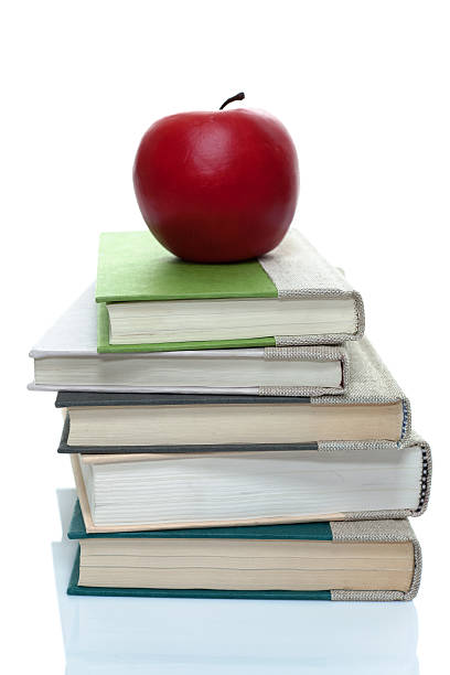 istock Stack of books with a red apple on top 468369578