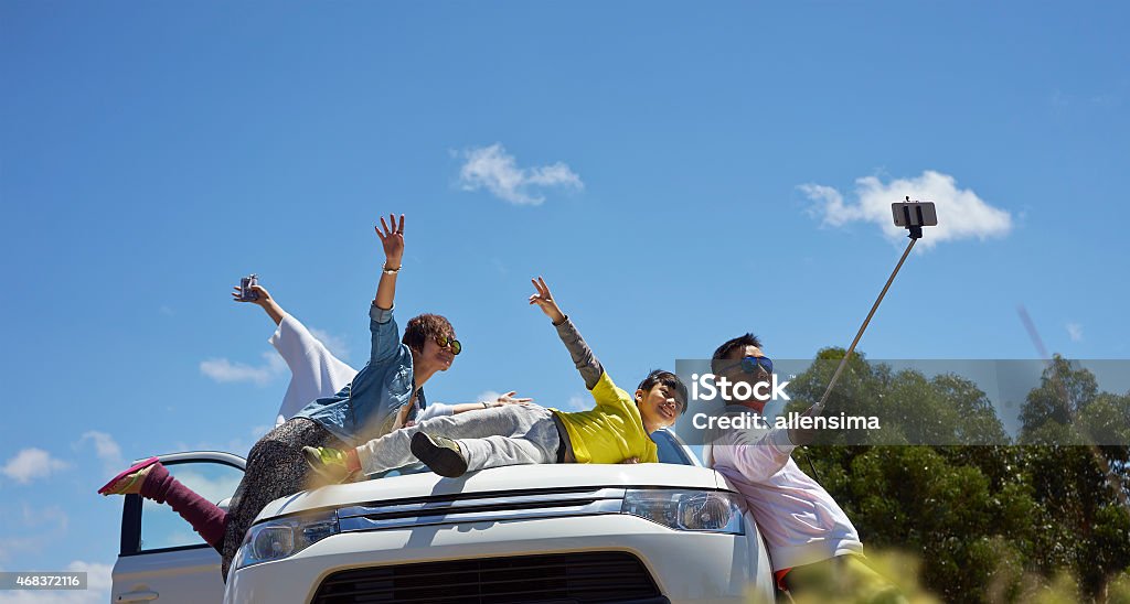 travelers taking photo themselves travelers taking photo themselves on trip Car Stock Photo