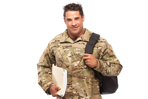 istock Smiling soldier with bag and books 468375434