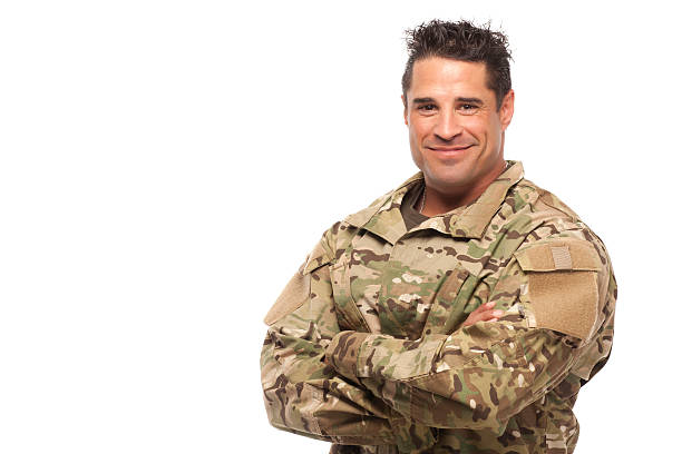 istock Army soldier with arms crossed 468376084