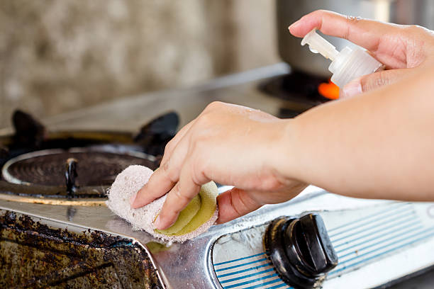 istock cleaning to the stove 468376768